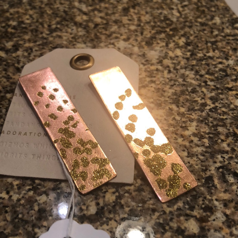 anthropologie woman’s earrings